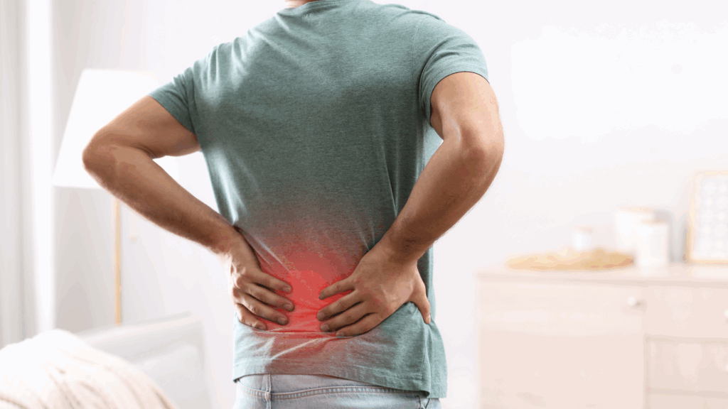 struggling with chronic low back pain, reflecting her discomfort.